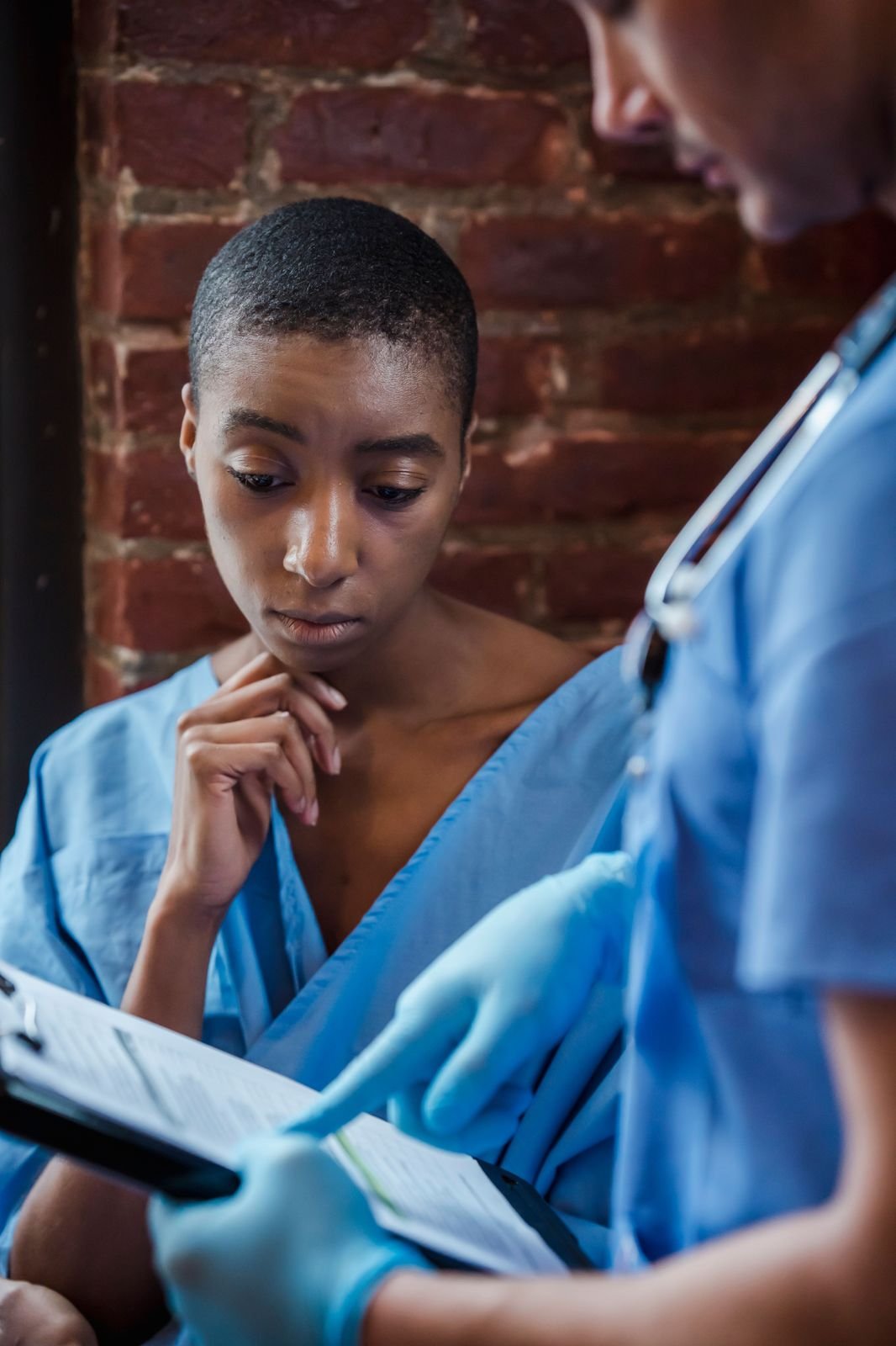 Doctor consulting with patient